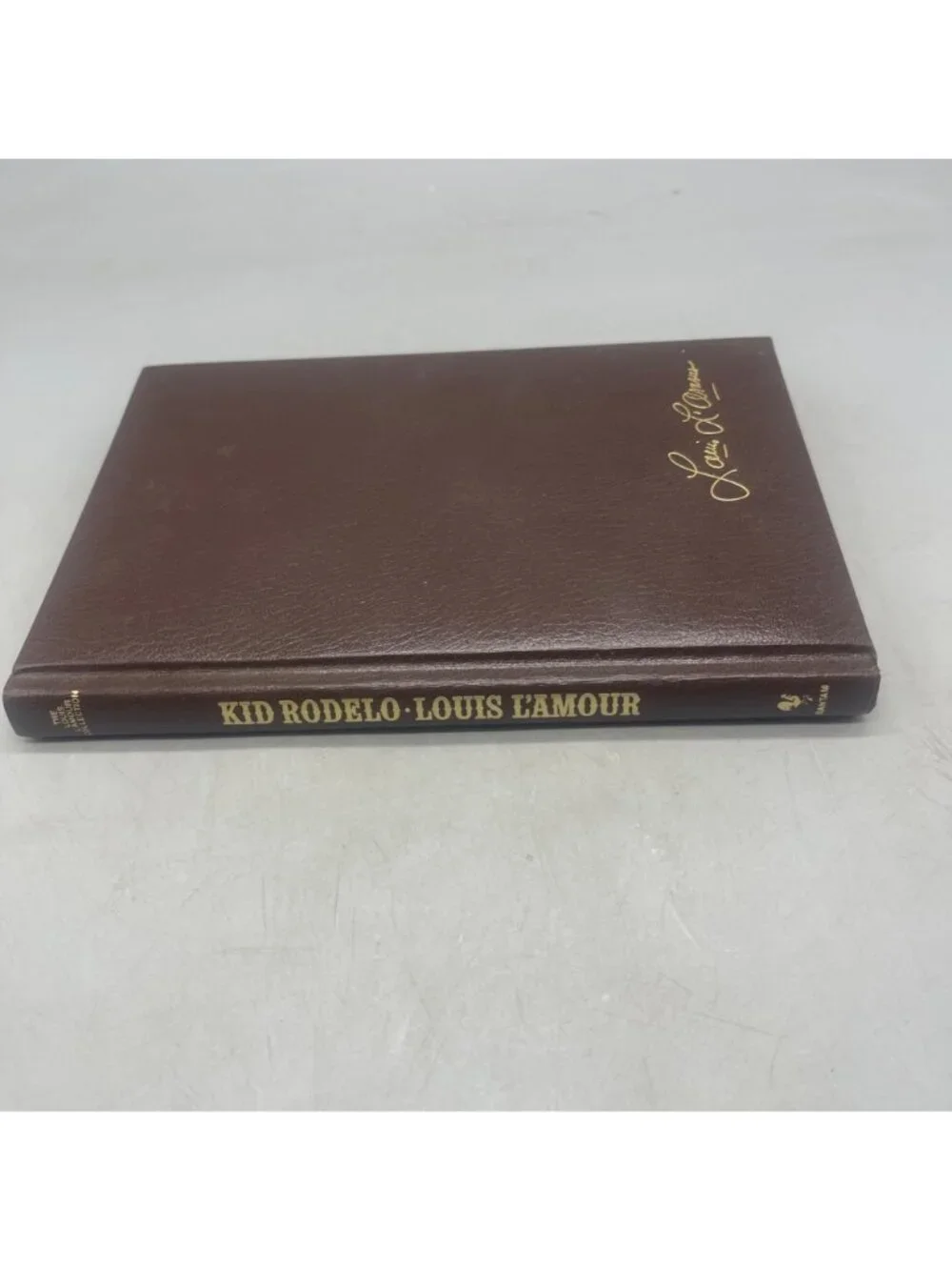 Kid Rodelo By Louis LAmour Brown Leather Hardcover 1986 Bantam Edition READ
